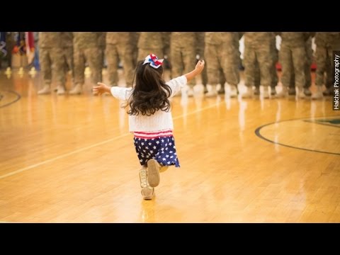 Little Girl Hugs Dad Before Military Ceremony Ends