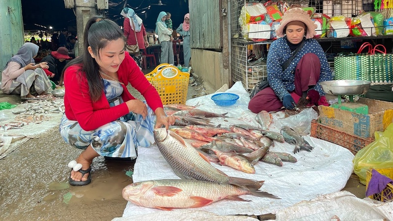 Wet market in the morning, Chinese style steamed fish cooking Countryside life
